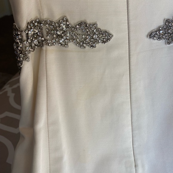 Nicole Miller Wedding Dress with sewn in crystal belt. Style is Dakota. - Picture 5 of 8